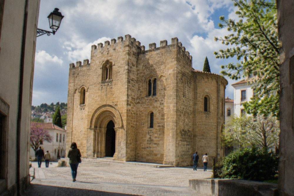 Spring sunshine on the facade of the Se Velha old cathedral in Coimbra